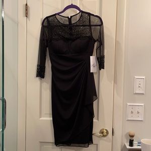 Brand new never worn with tags size 4 dress